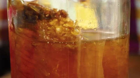Honey Jar Closeup Pan Up Stock Footage 218309528