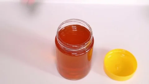 Honey Jar Opening Stock Footage 74796730