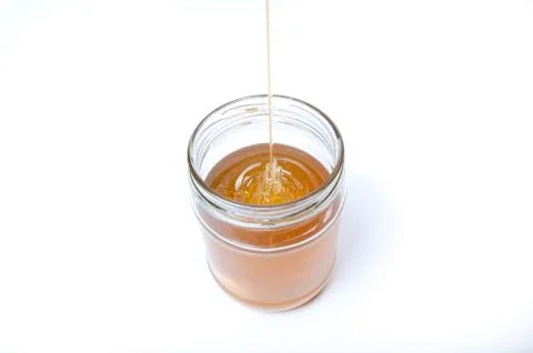 Honey in jar Stock Photos