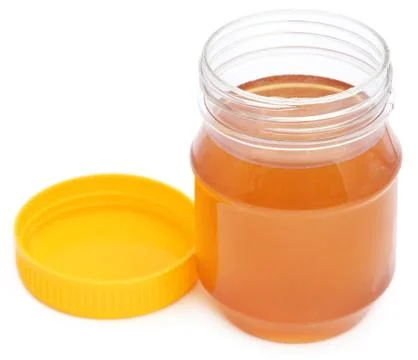 Honey in a jar Stock Photos