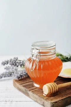 Honey in jar Stock Photos