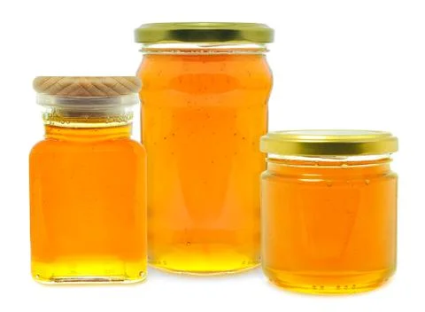 Honey in jars Stock Photos