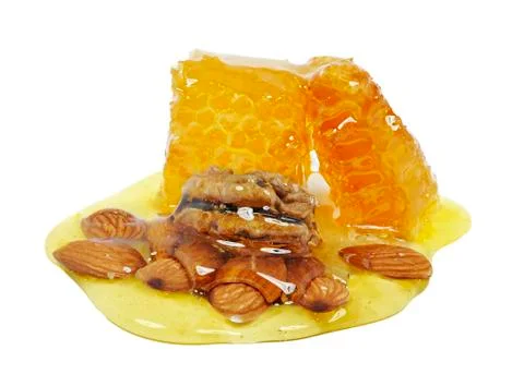 Honey with nuts on white background Foto stock