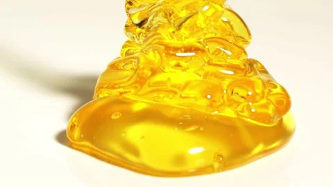 Honey pouring 4k Video stock 229334423