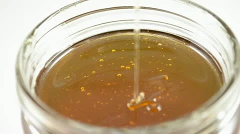 Honey in slow motion Stock Footage 11132254