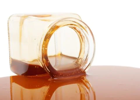 Honey spill Stock Photos