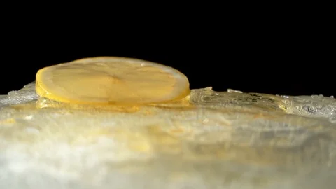 Honey spreads on ice Stock Footage 85860342