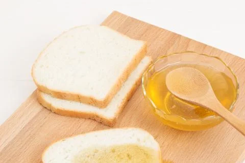 Honey white bread on the table Stock Photos