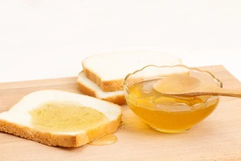 Honey white bread on the table Stock Photos