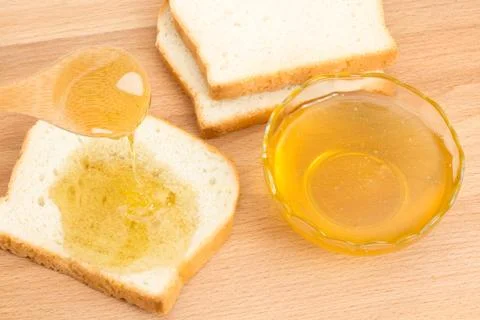 Honey white bread on the table Stock Photos