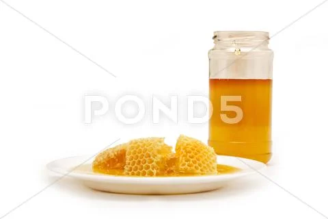 Honeycomb and Honey Jar, Isolated on White Background Stock Photos