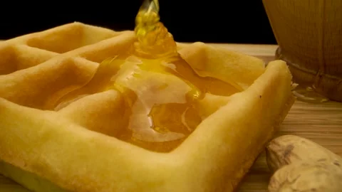 Honeycomb close up hitting camera Stockbeeldmateriaal 159736555