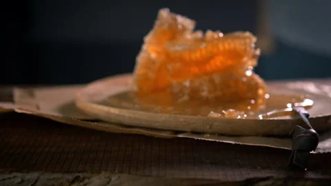 Honeycomb in honey on display Stock Footage 274703359