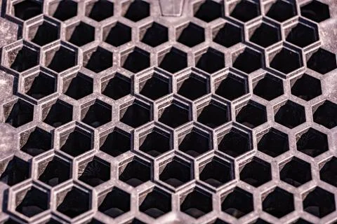 Honeycomb pattern structure creating an abstract geometric grid background Stock Photos