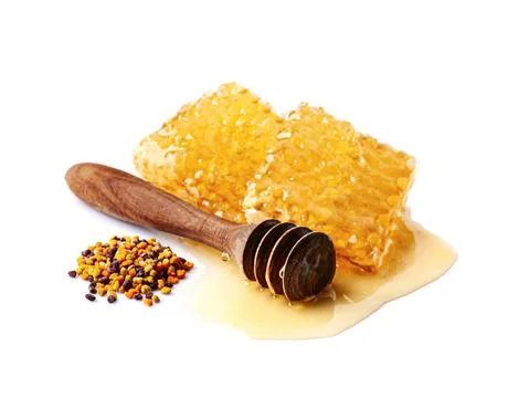 Honeycomb with pollen Stock Photos