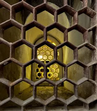 Honeycomb,hexagonal patterned window in Amer Fort,Amber Fort of Jaipur, Raj.. Stock Photos