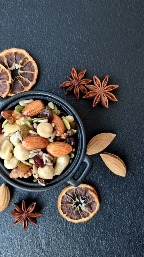 Honeyed cashew nuts, walnuts, hazelnuts, pine nuts and dried fruits Stock Footage 303696641