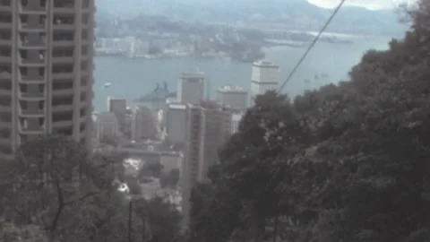 Hong Kong - 1978: View from cable-operated peak tram downhill from Victoria Peak Video stock 231101031
