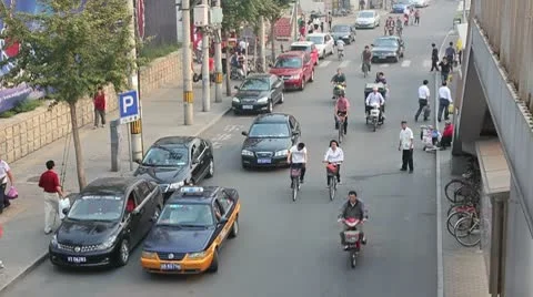 Hong Kong Bike & Car Traffic Stock Footage