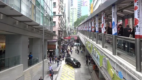 Hong Kong Central-mid-level escalator, traffic on the street, lifestyle. Stock Footage 138063868
