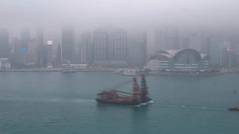 Hong Kong, Circa 2017: Time lapse of busy Victoria Bay with dramatic clouds Stock Footage 96498059