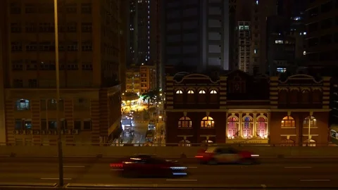 Hong kong city traffic street side night time panorama 4k china Stock Footage