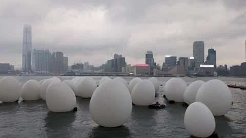 Hong Kong cityscape with floating Easter egg art object Stock Footage 271191507