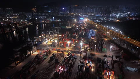 Hong Kong Container Terminal. Cargo Cranes Working At Night, Loading Shipping Video stock 312858734