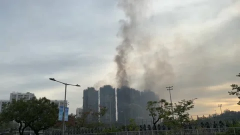 Hong Kong: Devastating fire ravages Wang Fuk Court in Hong Kongs Tai Po ... Stock Footage 321860334