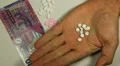 Hong Kong Dollar HKD, Counting Drugs and Money, Health Care, Colorful Pills HD Footage