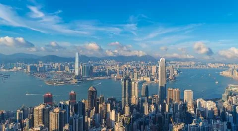 Hong Kong Downtown and Victoria Harbour. Financial district in smart city. Sk Stock Photos