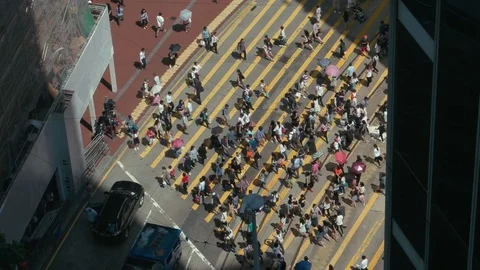HONG KONG -  Elevated street view with people on crosswalk. Causeway bay. 4K Stock Footage 81180775