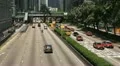 Hong Kong Island Skyline, Admiralty District, Tram, Car Traffic Bus, Commuters HD Footage