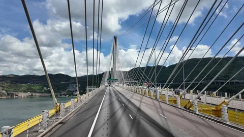 Hong Kong - Jun 27, 2024: Detailed view of bridge cables and structure against a Stock Footage 278227702
