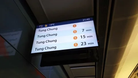 Hong Kong MTR Platform Information Panel Tung Chung Stock Footage 228903745