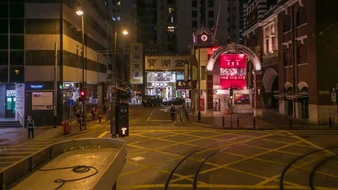 Hong Kong night streets hyper lapse from the view of a double decker tram Видео 217430241
