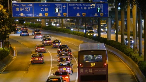 Hong Kong night traffic at freeway red taxi great numbers 스톡 동영상 110691491