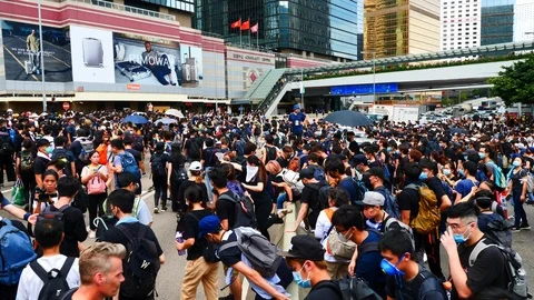 Hong Kong Protest Crowds Rush Across Street Video stock 112518339