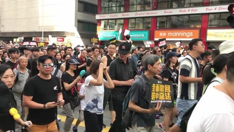 Hong Kong Protests 2019 Mass Demonstration in City Streets. Stock Footage 336447719