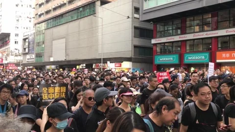 Hong Kong Protests 2019 Mass Demonstration in City Streets. Stock Footage 336448065