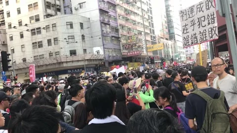 Hong Kong Protests 2019 Mass Demonstration in City Streets. Stock Footage 336448066