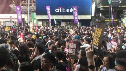 Hong Kong Protests 2019 Mass Demonstration in City Streets. Video stock 336448145