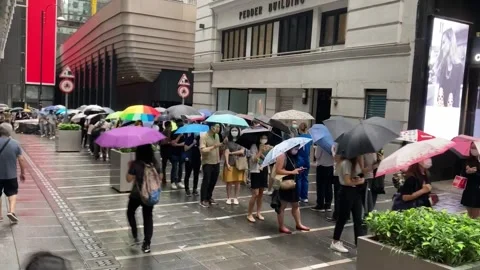 Hong Kong residents queue up in early hours for final issue of  Apple Daily, Hon Stock Footage 204039348