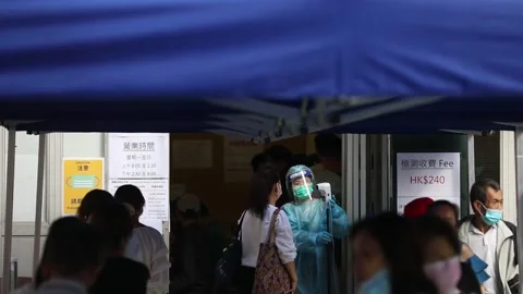 Hong Kong residents queue to get coronavirus test, Hong Kong, CN - 21 Nov 2020 Stock Footage 203982606