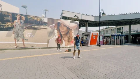 Hong Kong street dancer performs break dance on streets of Kowloon steadicam 스톡 동영상 109638809