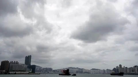 Hong Kong timelapse of daytime cloudy day at Victoria Harbour - 4k Stock Footage 292458514