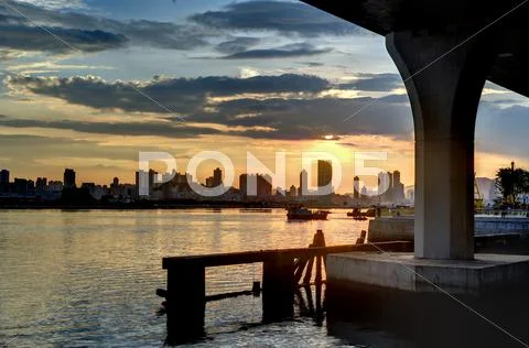 Hong kong under brigde sunset Stock Photos