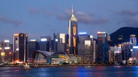 Hong Kong Victoria harbour and city skyline at night Stock Footage