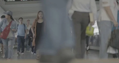 Hongkong pedestrians downtown rush hour, ungraded Stock Footage