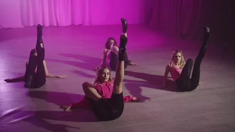 Honing the elements of dance with a coach during a group class. Stock Footage 241795855